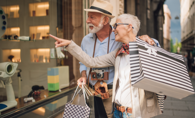 Retired couple shopping while traveling